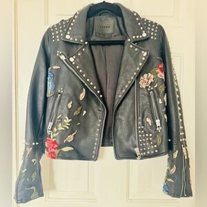 Faux studded leather jacket with flower embroidery embellishment.